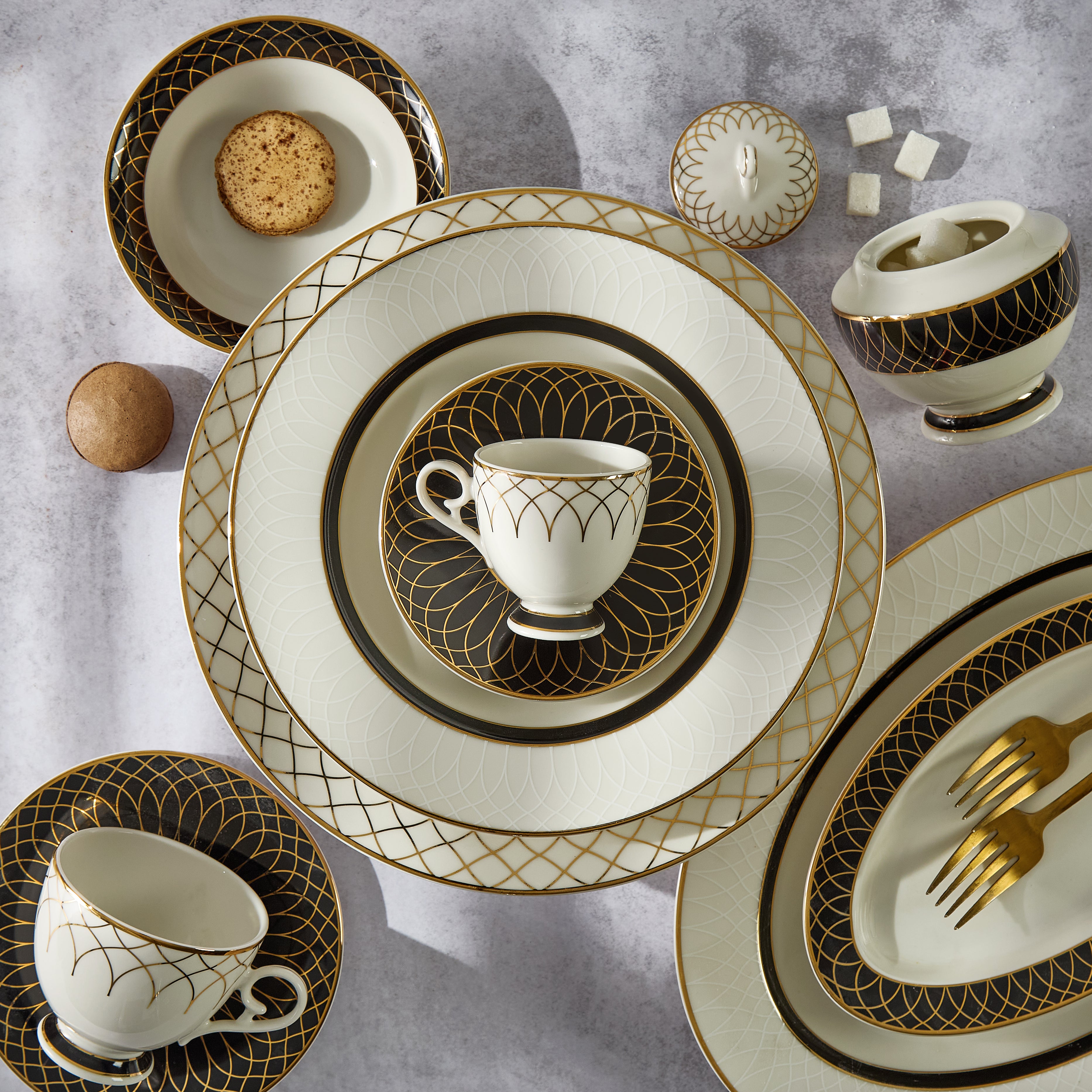 Elegant Porcelain tableware set with gold and black patterns. Fathy Mahmoud Porcelain.
